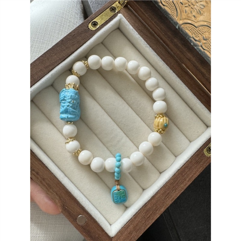 牛骨圆珠单圈手链搭配菱镁矿扎基女神扎基牌金膏玉百香籽手串s421