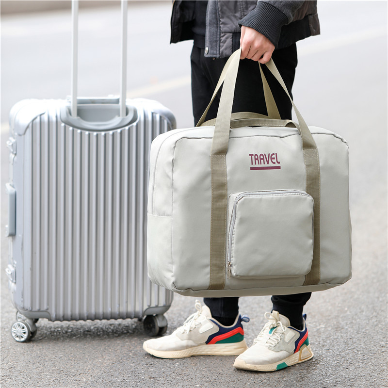 新款大容量旅行收纳包单肩收纳袋折叠手提包飞机包礼品袋现货批发