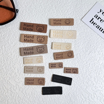 小熊头笑脸皮标handmade手工缝纫儿童帽子围巾商标diy头绳背贴标