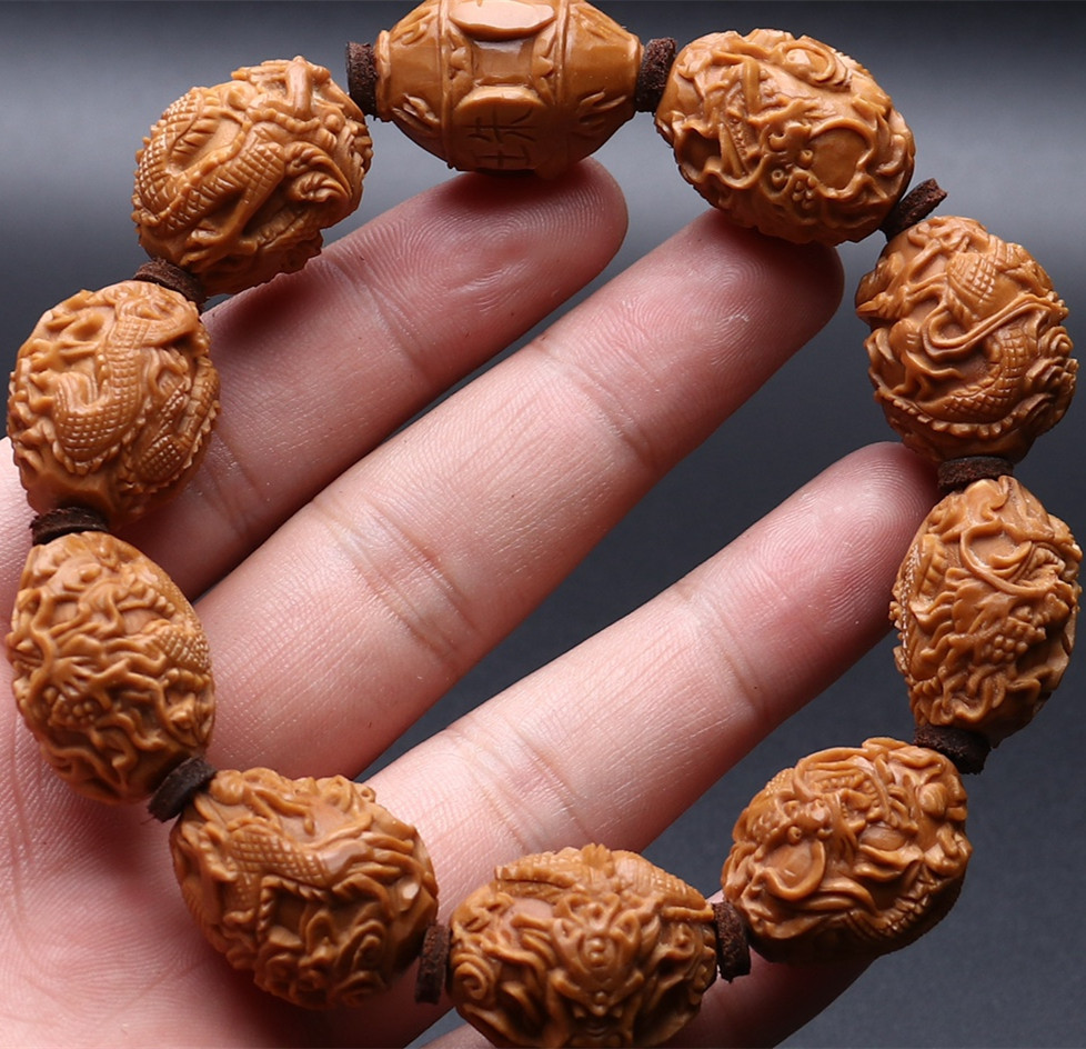 橄榄核雕刻手串九龙戏珠橄榄核老油核龙手持手链文玩把玩件收藏