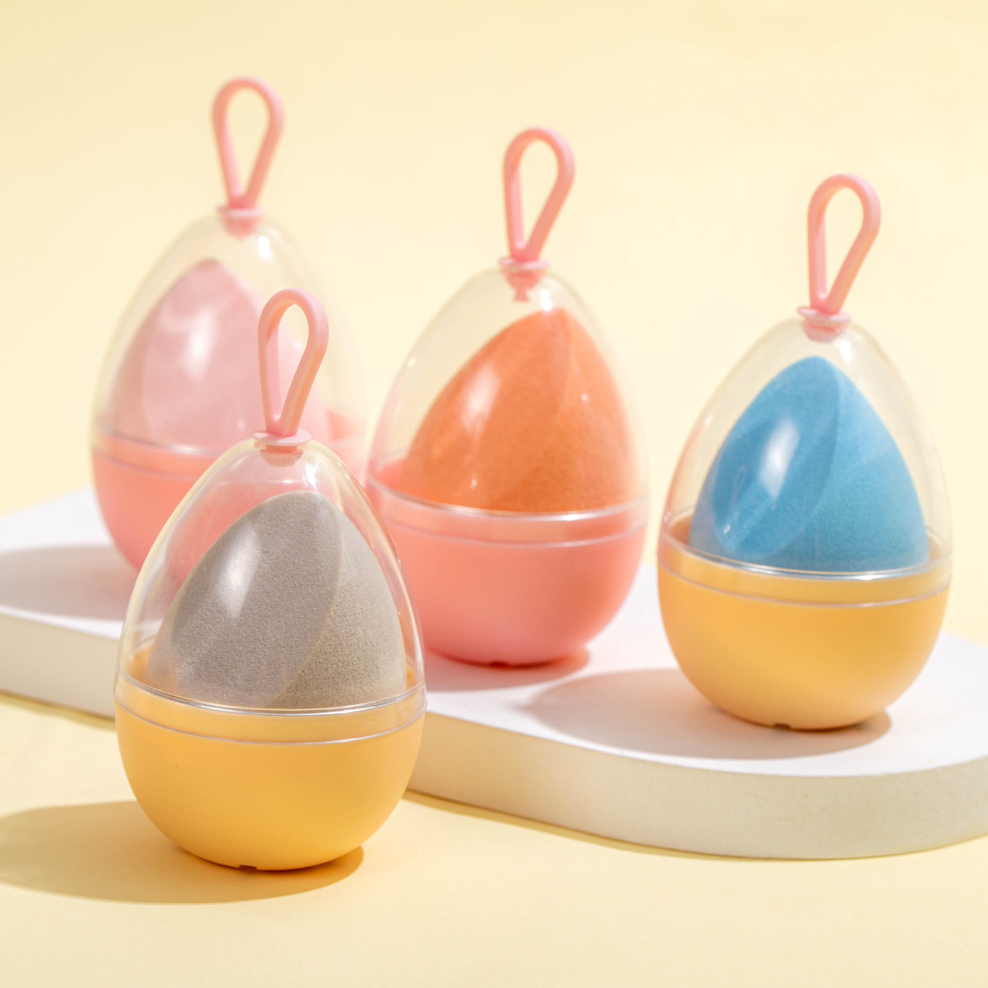 厂家订制新款鸡蛋壳挂绳美妆蛋 柔软q弹包装新颖易携带美妆蛋