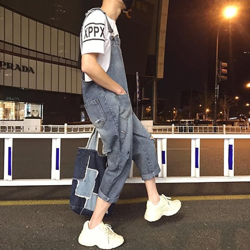 破洞牛仔背带裤男潮牌大码宽松显瘦吊带九分裤学生男女情侣装