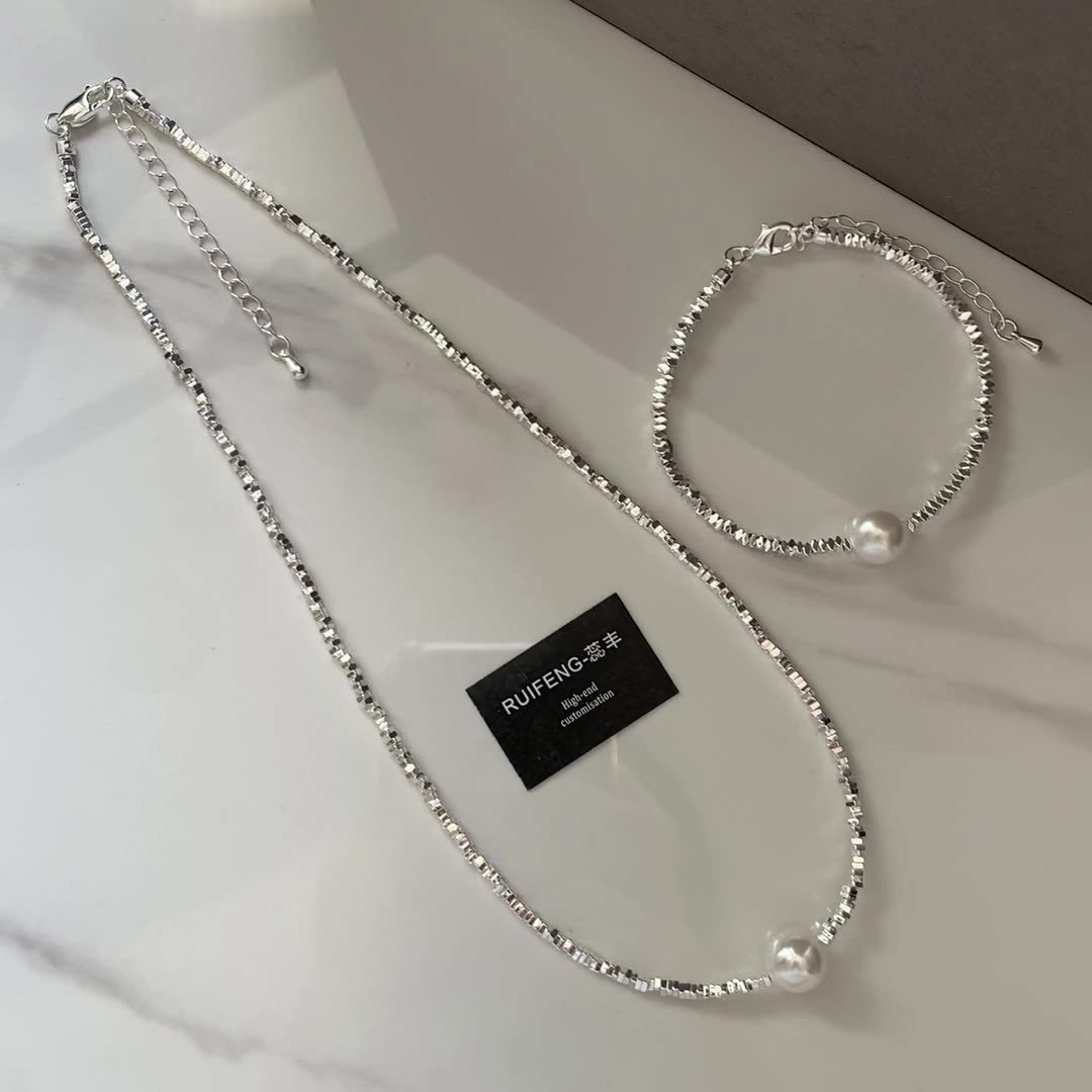 ornament necklace high-end affordable luxury niche high-grade elegant necklace small pieces of silver pearl sweater chain necklace accessories for women