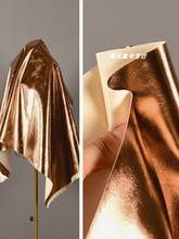 金属质感-棕色贴膜PU皮革面料 创意服装无弹反光布软装背景布布料