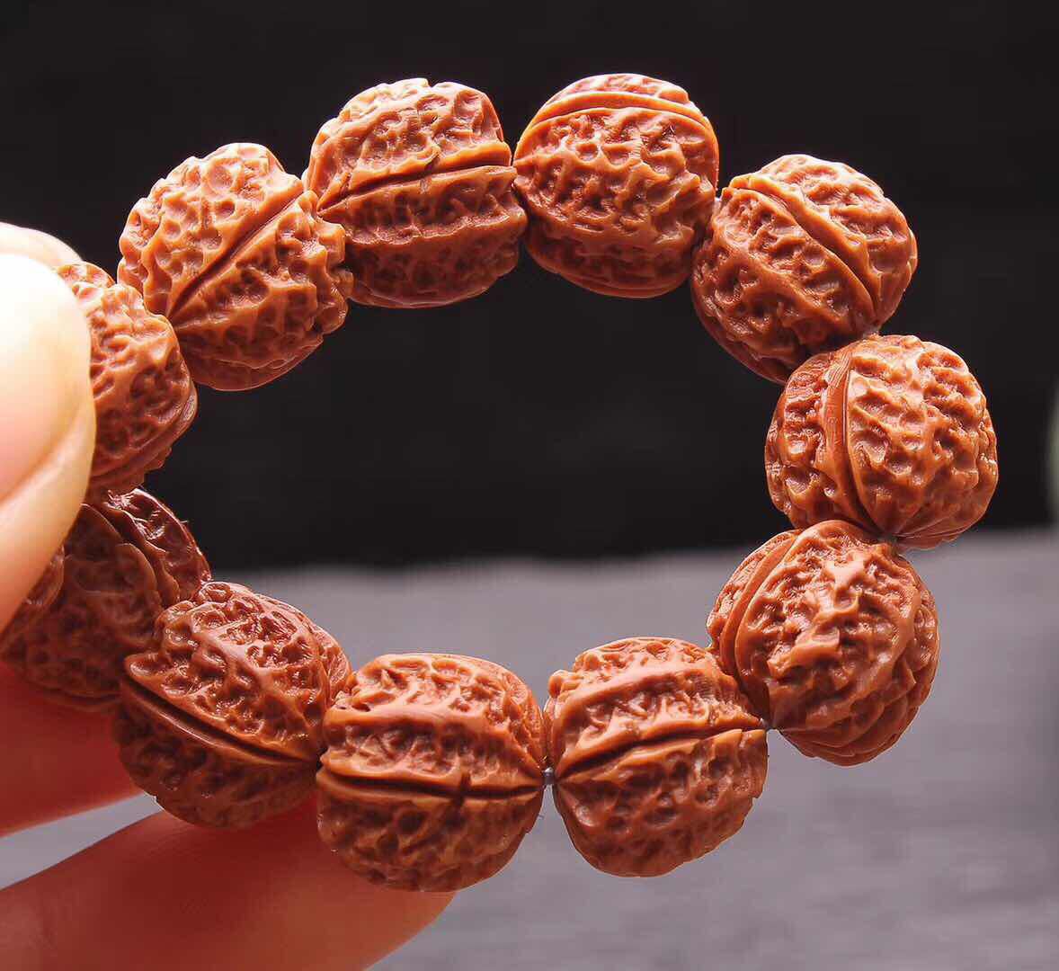 小核桃龙纹京八棱手串龙纹桃核雕刻手串正圆矮桩橘红皮文玩批发