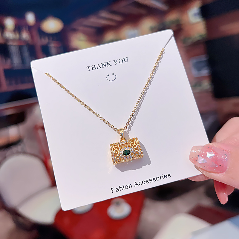 Affordable Luxury Fashion Emerald Hollow Bag Necklace Temperament Wild Online Influencer Clavicle Chain Personality Titanium Steel Ornament Wholesale