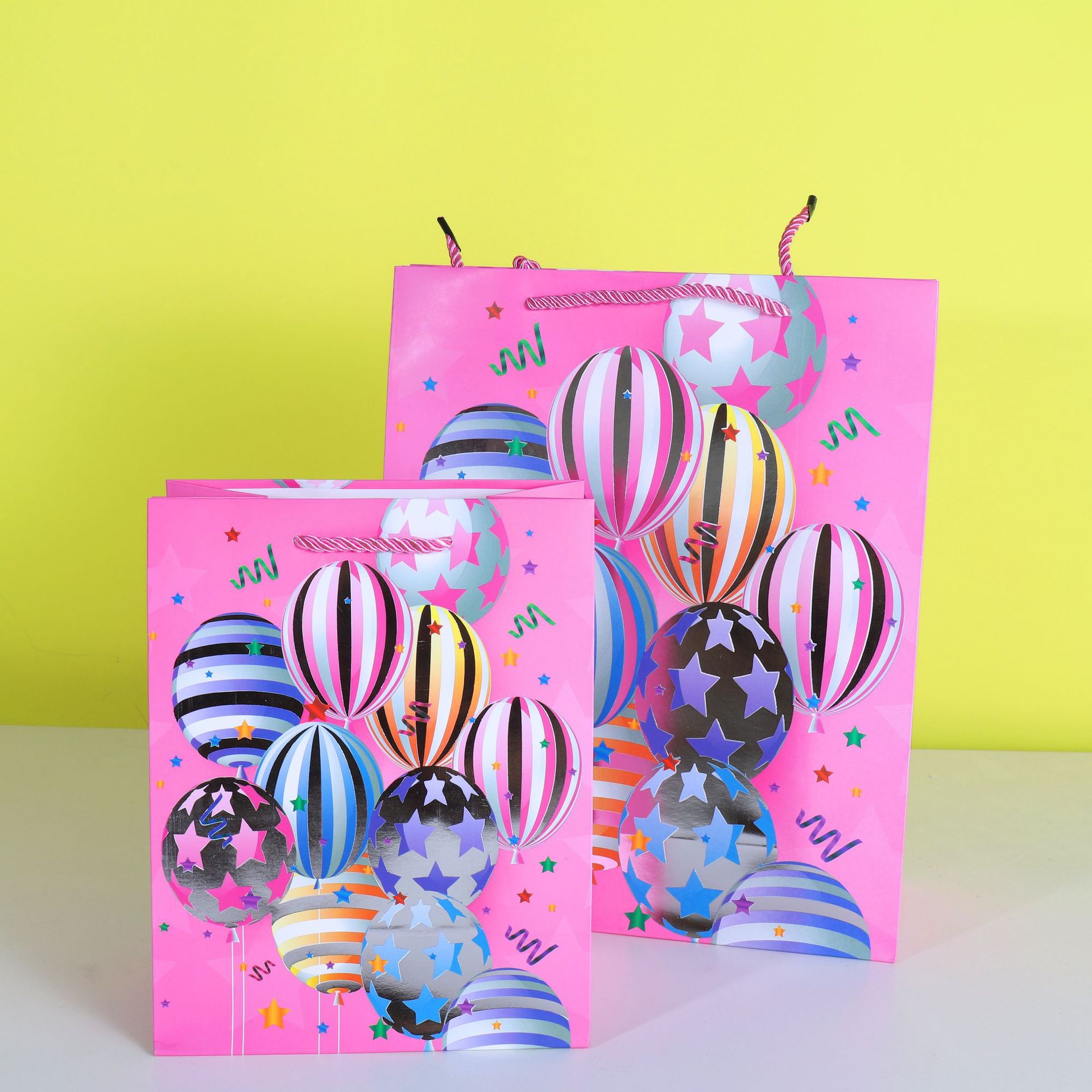 烫金生日系列纸袋子蛋糕庆生礼品袋气球白卡手提袋现货批发环球袋