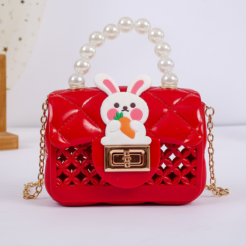 2023 New Hollow Shoulder Portable and Fashion Pearl Chain Mini Crossbody Pouch Factory in Stock Gel Bag