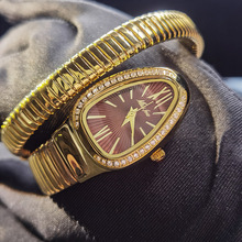 MISSFOX蛇型缠绕女士腕表 新潮时尚个性红色蛇头镶钻金色石英手表