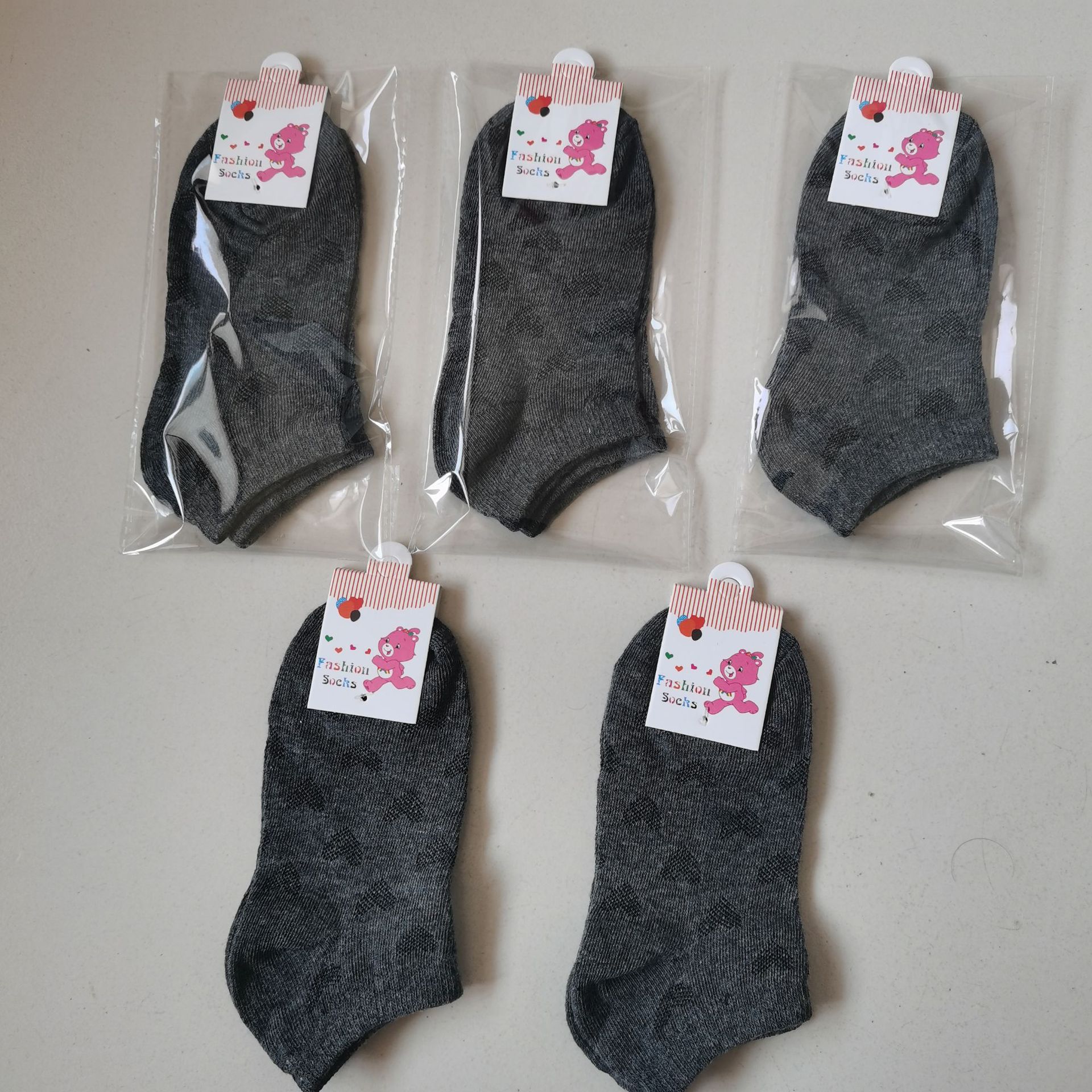游乐场赠品袜子四季儿童独立包装短袜中性深灰色暗花男女童船袜