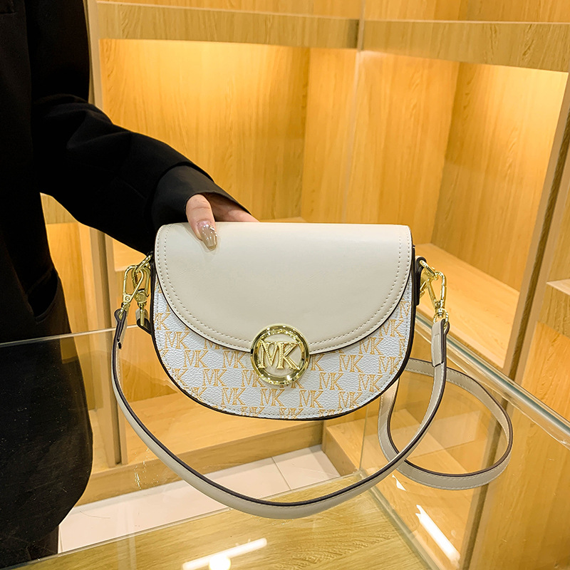 香港mk正品真皮半圆马鞍包包2022新款潮夏季手提单肩斜挎腋下包女