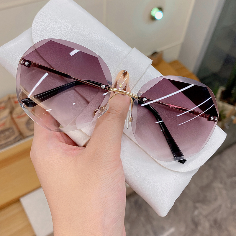 2022 New Irregular Rimless Sunglasses Women's Fashion Metal round Rim Sunglasses Ins Ocean Color Sun Glasses