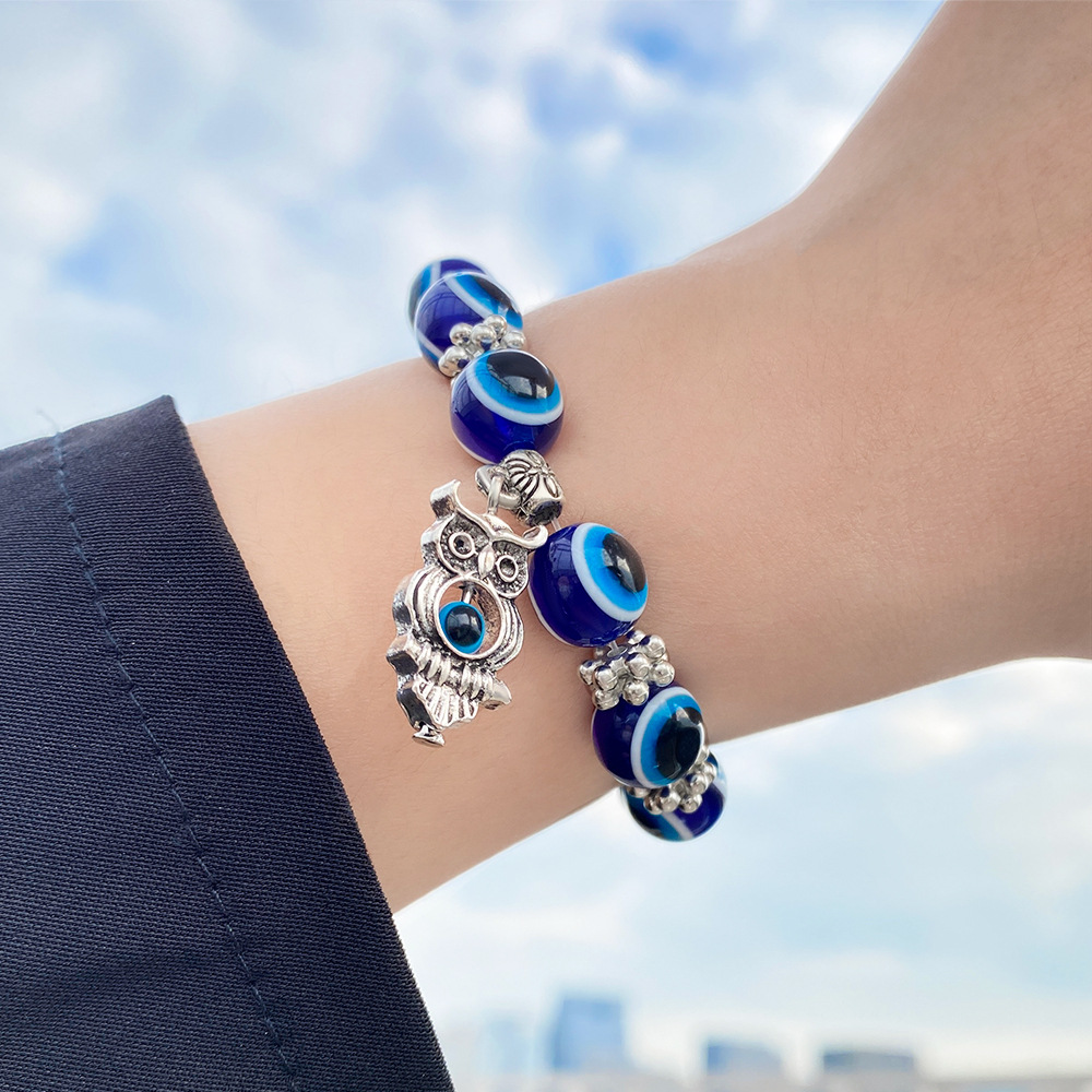 Amazon Hot Devil Eye Bracelet Butterfly Elephant Fatima Hand Pendant Resin round Beads Blue Eyes Bracelet