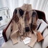 2022 Autumn and winter new pattern Sense of design wool Plaid tassels Shawl False two High collar knitting Cardigan sweater