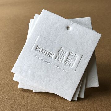 吊牌 女装白色木棉纸卡片 童装挂牌凹凸 轻奢-阿里巴巴