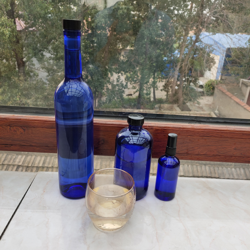 家用无铅蓝色玻璃太阳水瓶 零极限清理工具饮用水玻璃瓶送贴纸