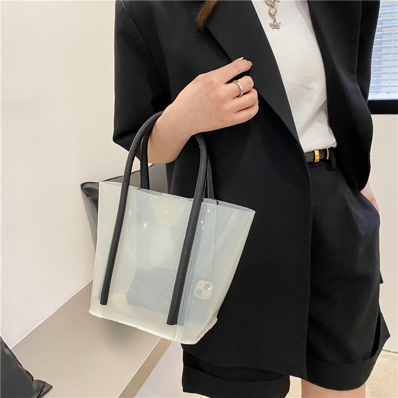 New Summer Laser Women's Bag Fashionable Casual Transparent Large Capacity Tote Bucket Bag Versatile Handheld Gel Bag Wholesale