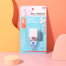 日本KM.1336.多用魔力牙膏挂架 无痕胶贴洗面奶收纳挂夹子批发