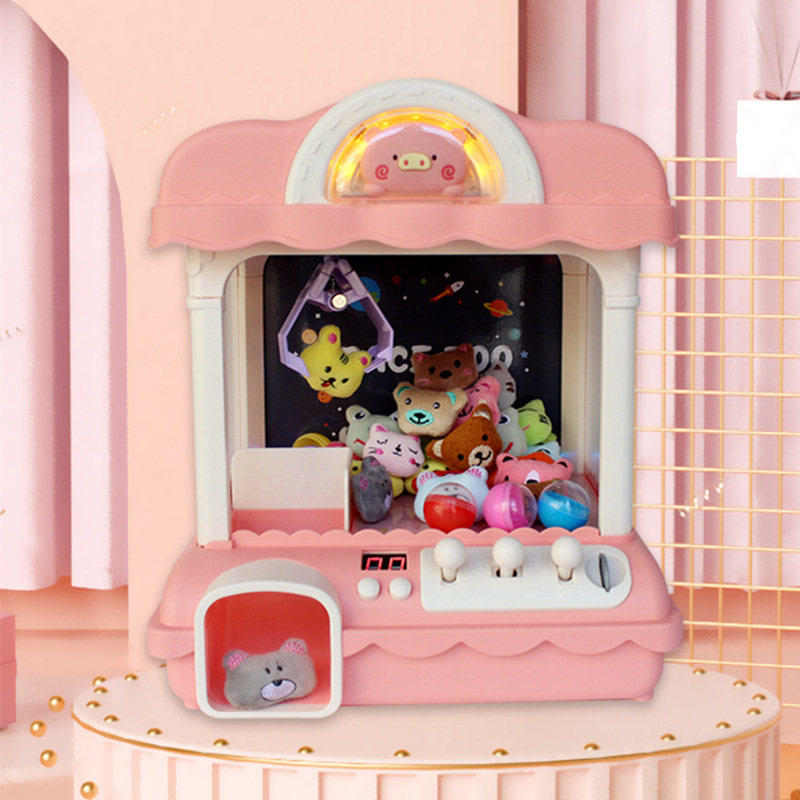 儿童迷你抓娃娃机家用夹娃娃机玩具小型电动夹公仔糖果机扭蛋机
