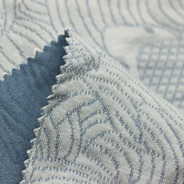 提花空气层锦鲤鱼跳龙门3d针织纬编色织绗缝提花夹丝布空气层面料