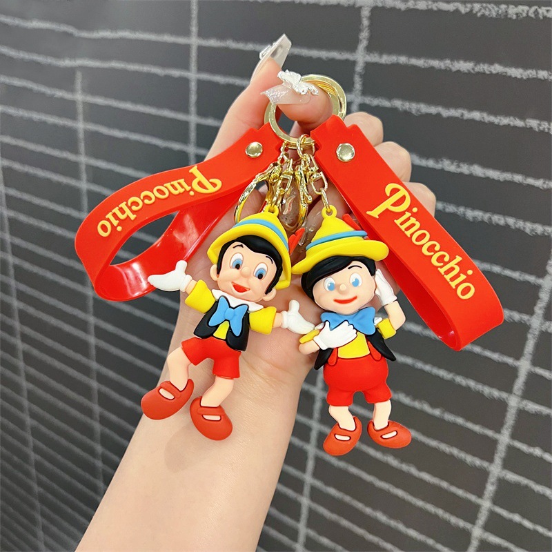 pinocchio keychain nostalgic story old carpenter lying long nose boy key chain men‘s and women‘s handbags pendant currency