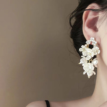 复古系精致高级风轻奢感流苏白色花朵耳环小众设计感耳饰品批发女
