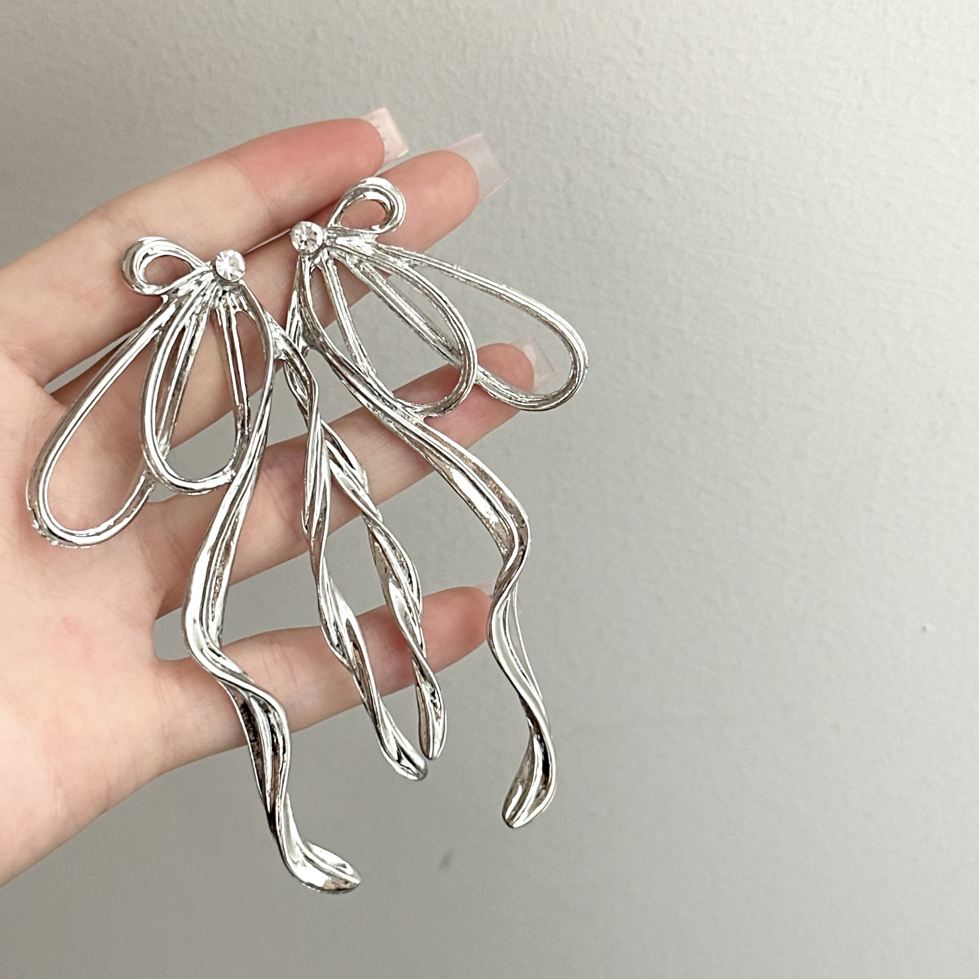 长款流苏蝴蝶结耳环韩国设计简约金属冷淡风耳坠银针个性耳饰耳夹