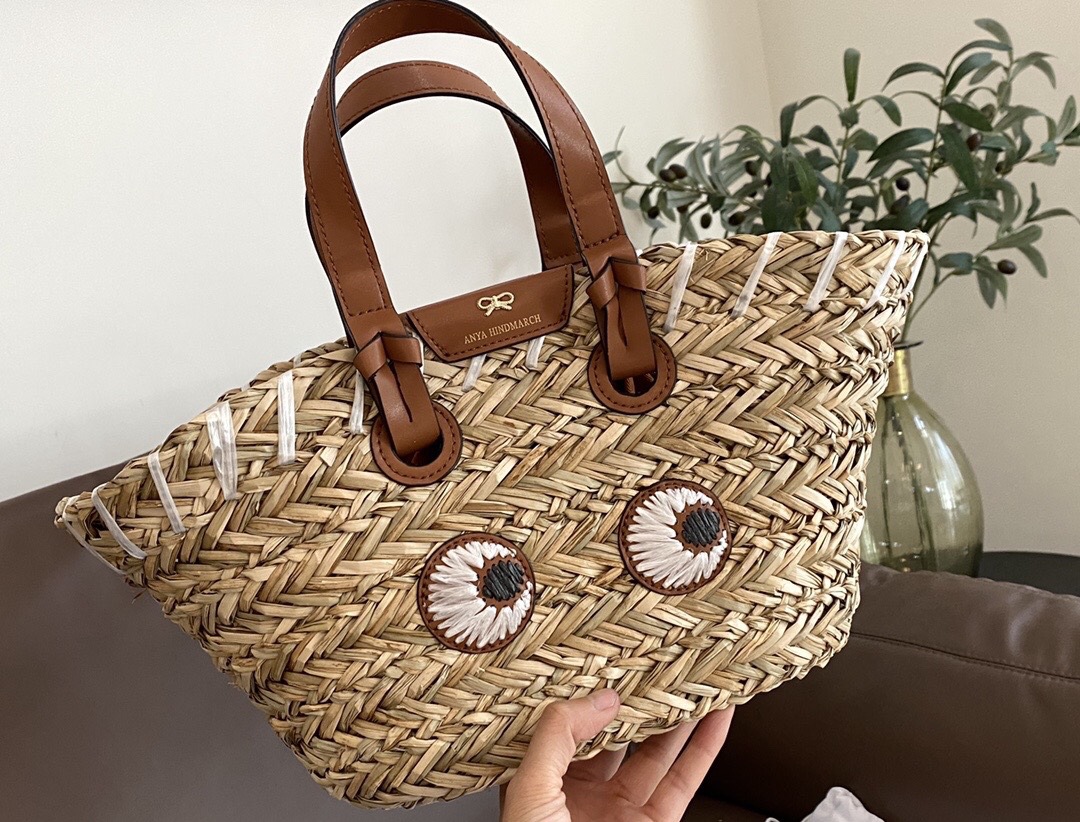 包邮新款安雅大眼睛草编手提袋森系时尚沙滩包手工菜篮子抽绳编织