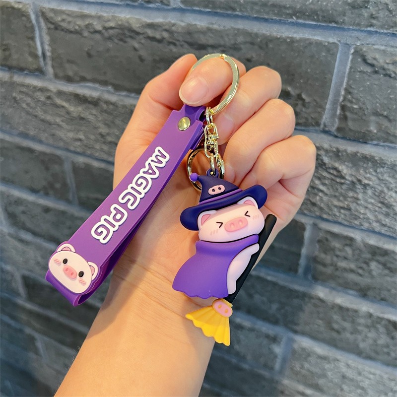 Creative Genuine Magic Pig Keychain Cute Magic Pig Riding Broom Pig Key Chain Men's and Women's Handbags Pendant Wholesale