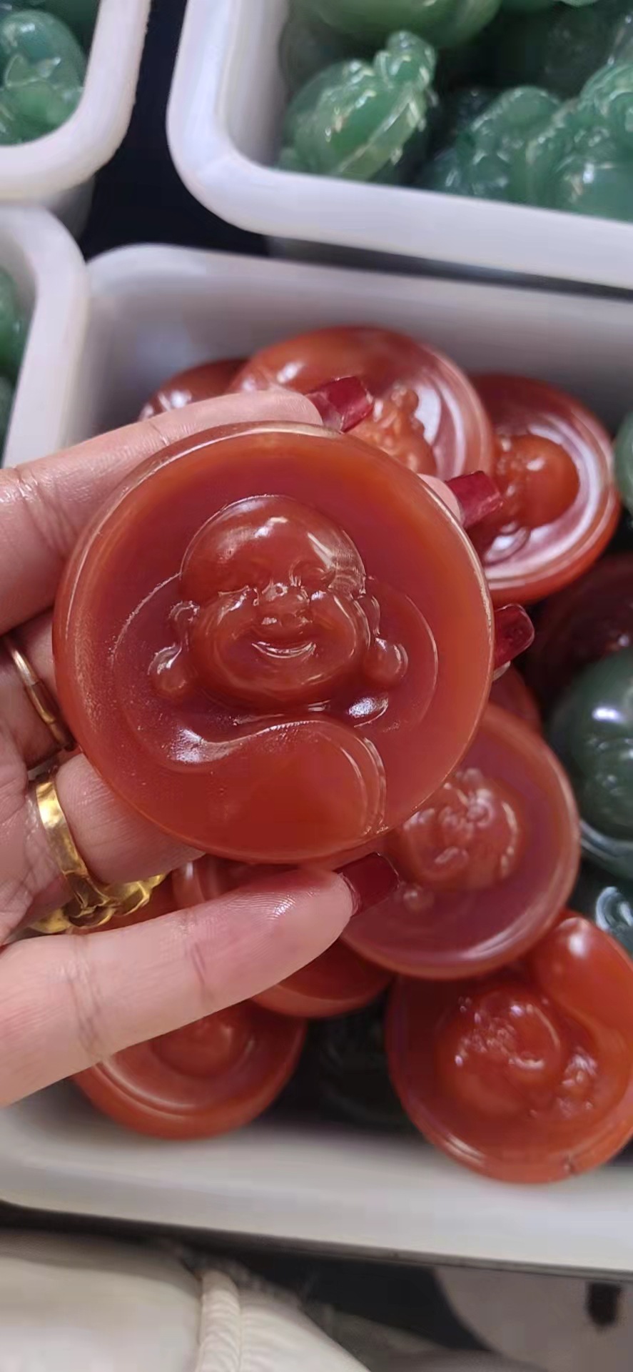 厂家批发新疆金丝玉杜热红笑佛挂件戈壁石佛公吊坠