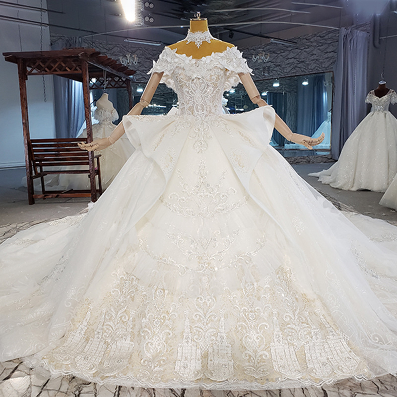 夏季新款欧美宫廷风高档一字肩蕾丝闪片钉珠豪华大拖尾主婚纱钉珠