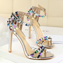 Women's stiletto open-toed sandals with colored rivets