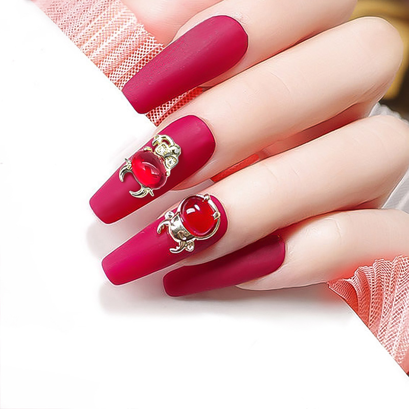 2021新年款牛头锆石饰品美甲爆闪红猫水钻指甲装饰批发货量大从优