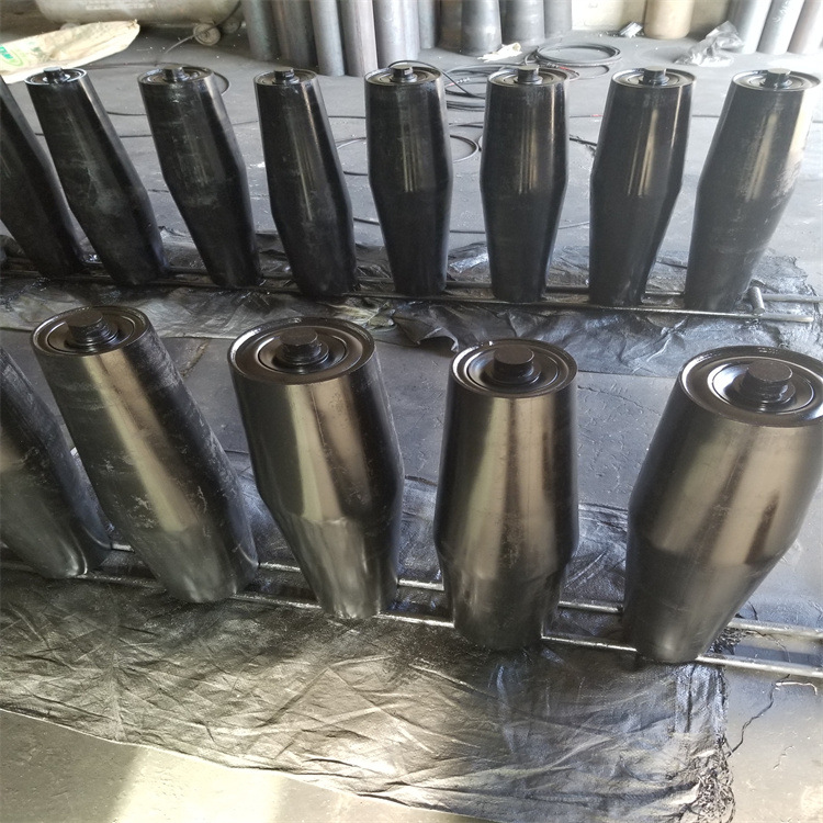 0 kg托辊简介托辊是带式输送机的重要部件,种类多,数量大.