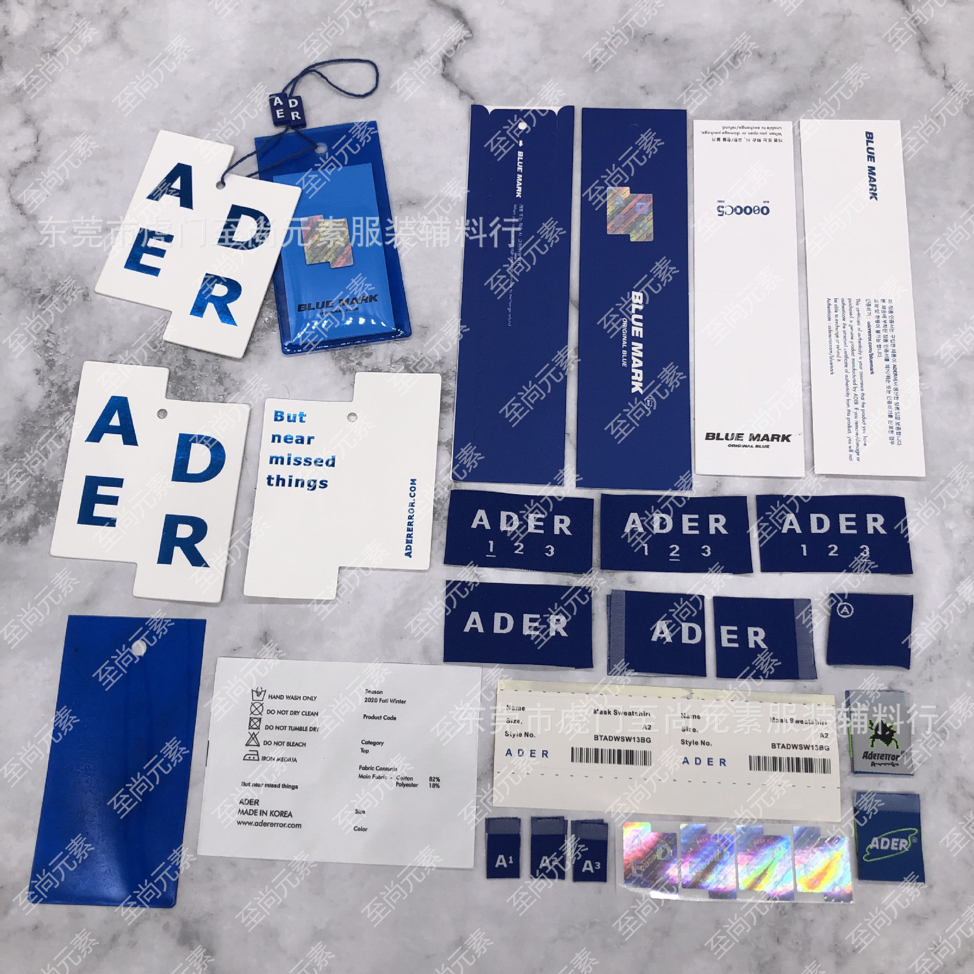 韩国ader吊牌吊粒领标挂牌包装袋防伪洗水标胶卷贴纸服装辅料现货