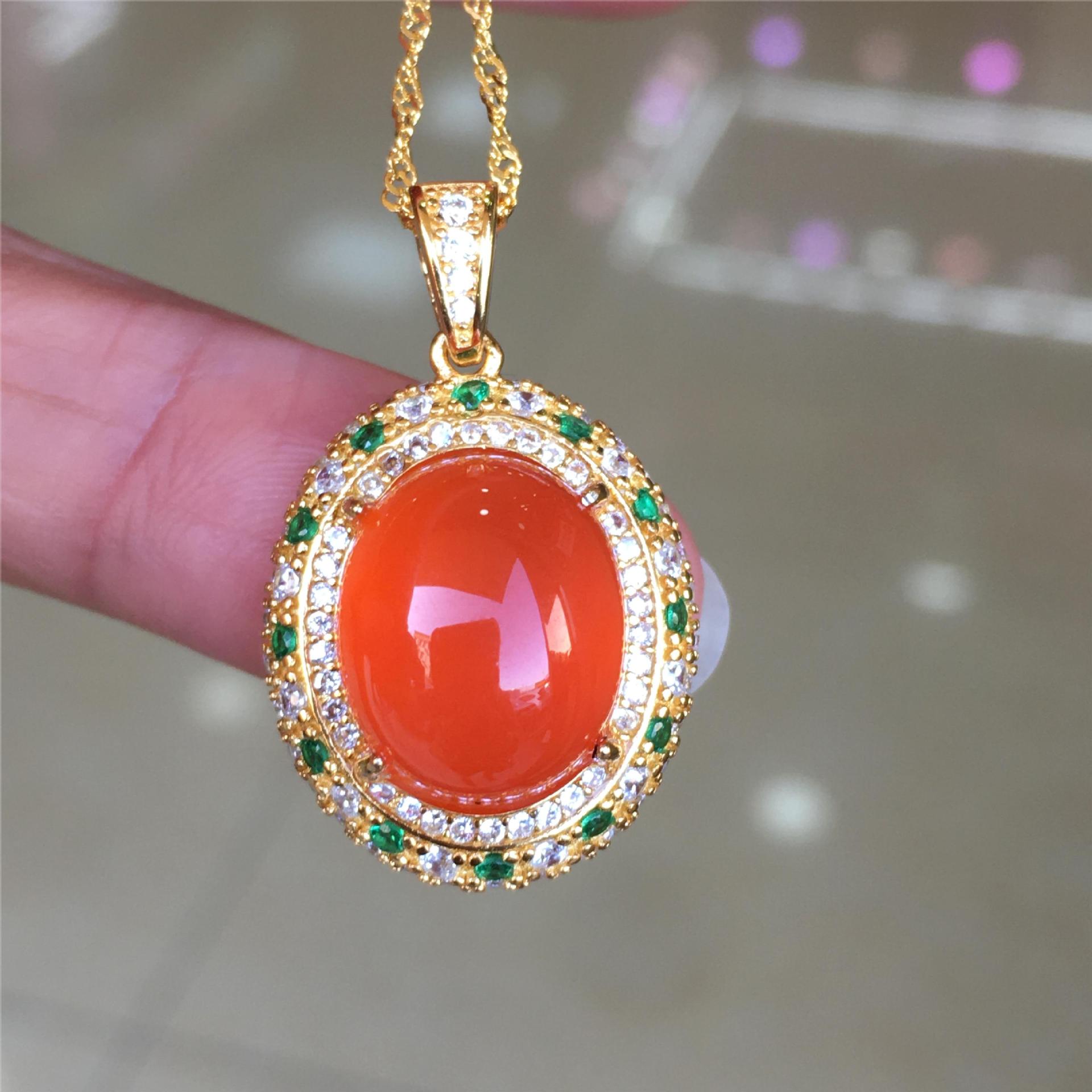 精品保山冰红新款吊坠琥珀色高冰起荧光s925银镶嵌大蛋面南红项坠