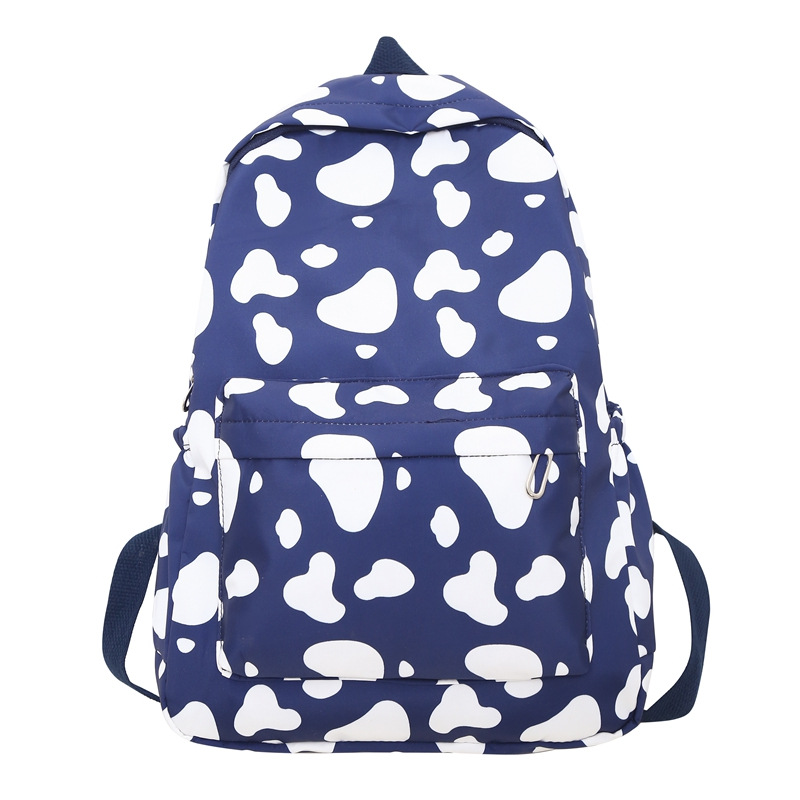 可爱印花奶牛纹双肩包女学院风初高中大学生书包韩版大容量背包