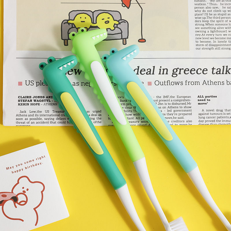 Promotional Cartoon Crocodile Toothbrush Silicone Soft Bristles Toothbrush Super Clean Cute Portable Toothbrush Factory Wholesale