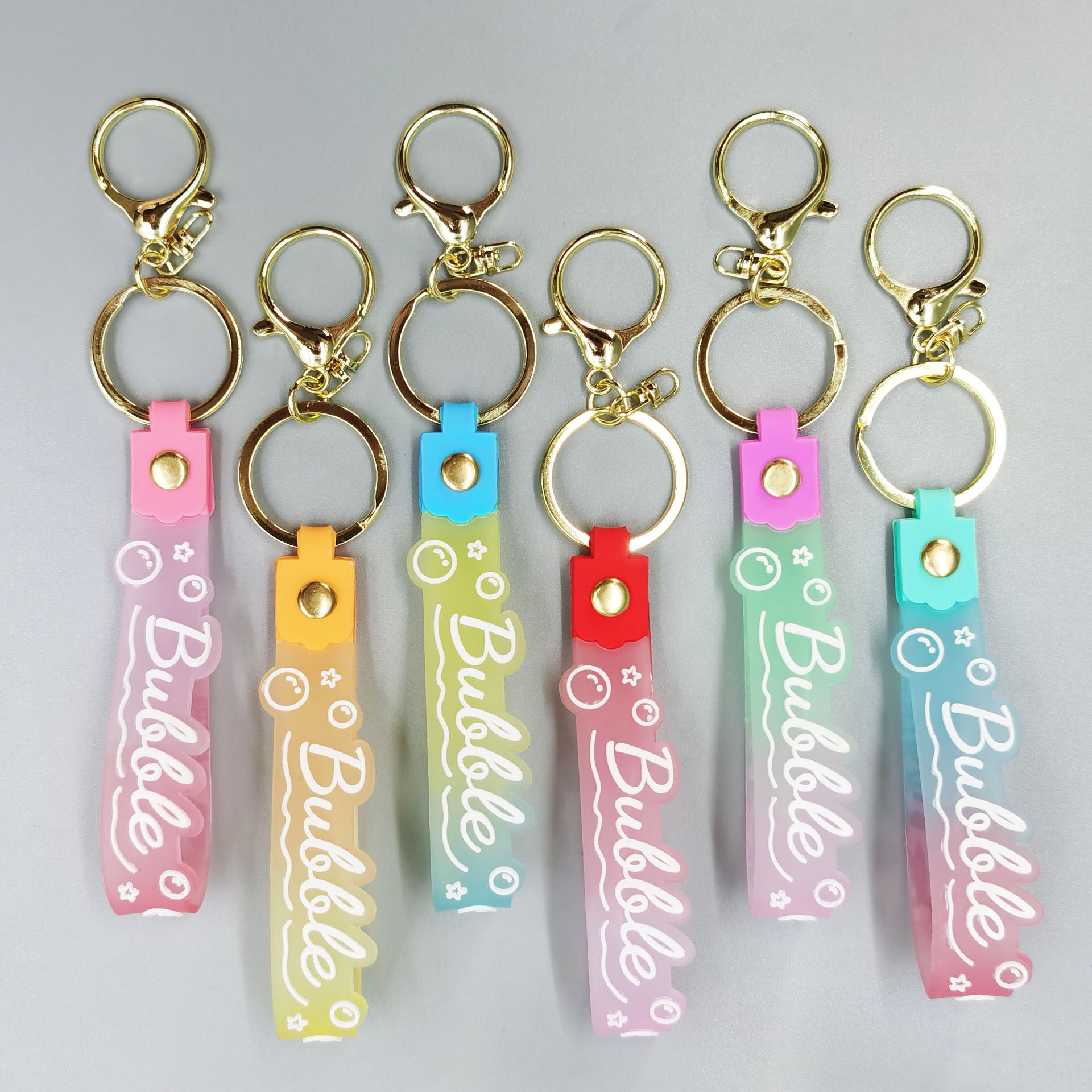 糖果渐变色透明pvc软胶钥匙扣绳硅胶钥匙链手绳流沙瓶礼品小挂件