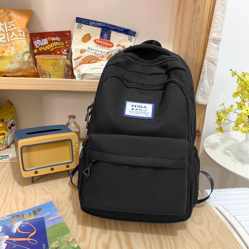 2023 New Middle School Student Schoolbag Female Junior High School Student Burden Alleviation Backpack High School Student College Style Pure Color All-Matching Backpack