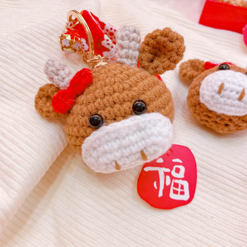 h1231a06 新年款手工钩织可爱蝴蝶结小牛招财钥匙扣包包挂件饰品
