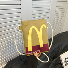麦当劳新款斜挎包高级感手拎袋帆布女包手机零钱包个性学生单肩包