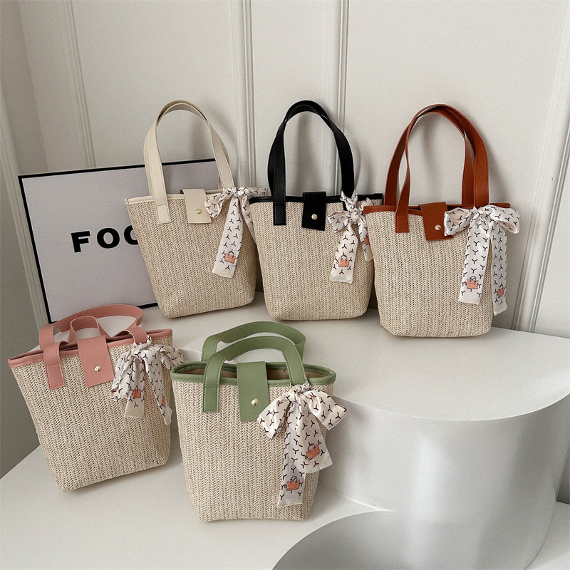 简约洋气手提水桶小包包2024新款韩版时尚单肩包女撞色通勤小拎包