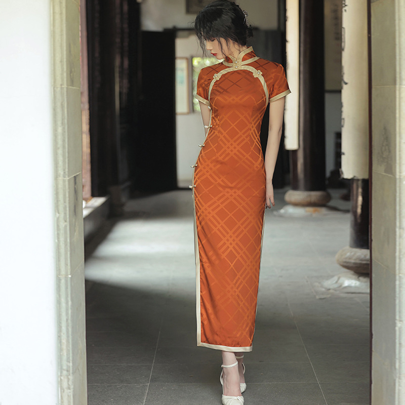 旗袍年新款素雅复古改良连衣裙秋季年轻款橘色长款风