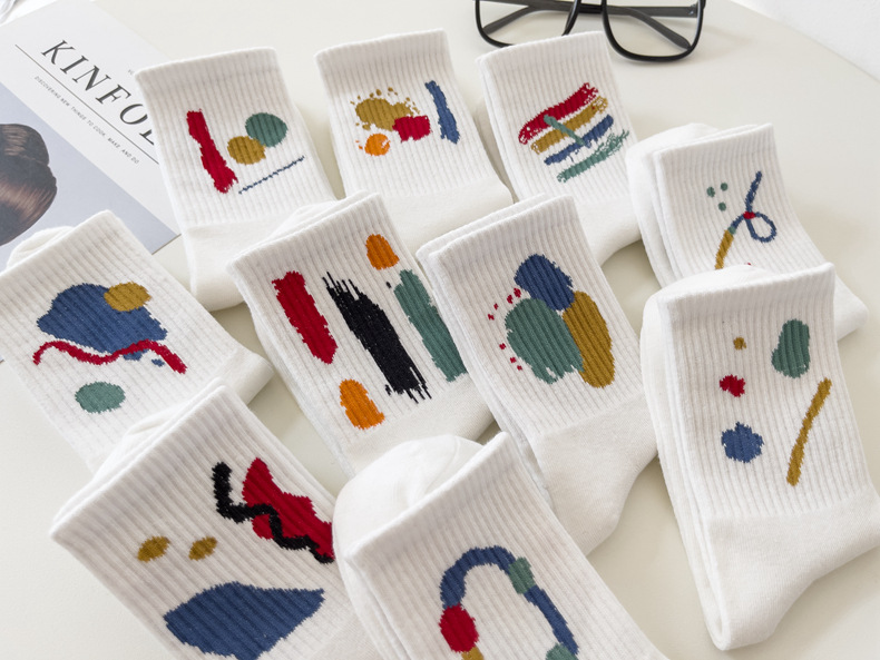 白色涂鸦女袜子女中筒ins潮流简约秋冬款韩版学院风运动长筒棉袜