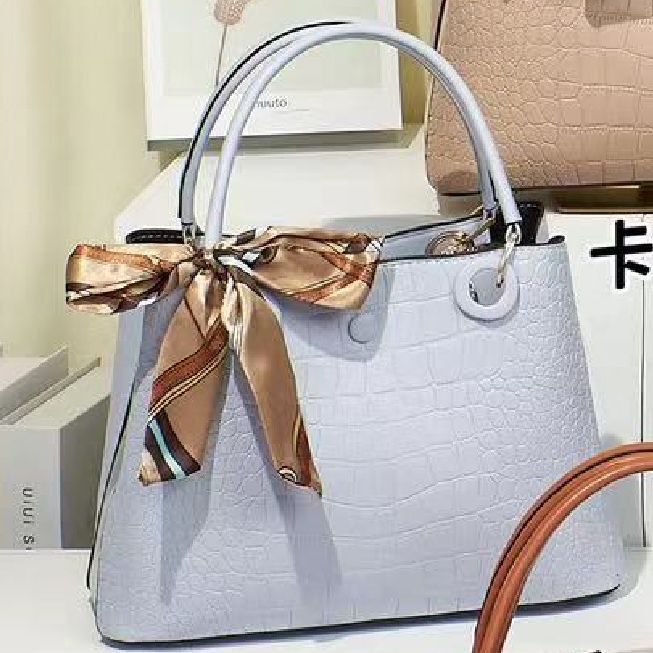 new women‘s bag 2023 foreign trade trend pu stone pattern shoulder crossbody portable large capacity middle-aged women‘s bags wholesale