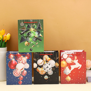 圣诞节新款多彩组合礼品袋撒粉白卡纸袋铃铛麋鹿创意手提袋批发