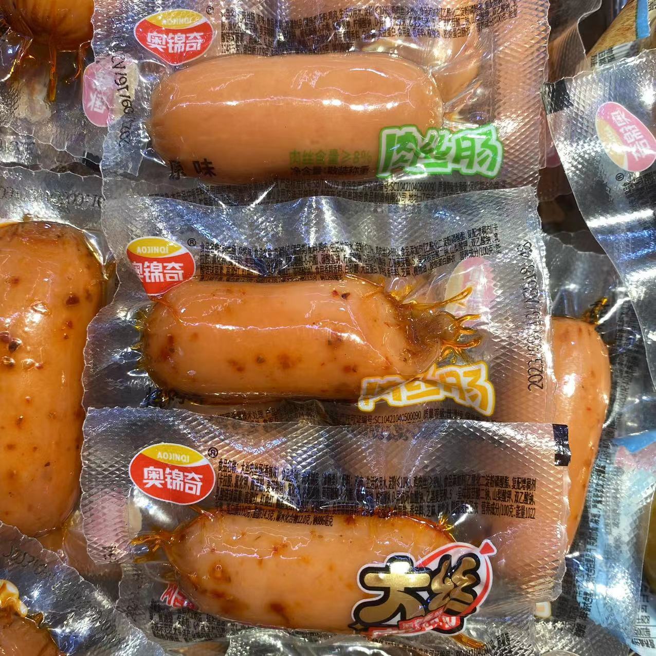 奥锦奇香辣肉丝肠即食散装称重热狗休闲解馋火腿肠泡面搭档-阿里巴巴