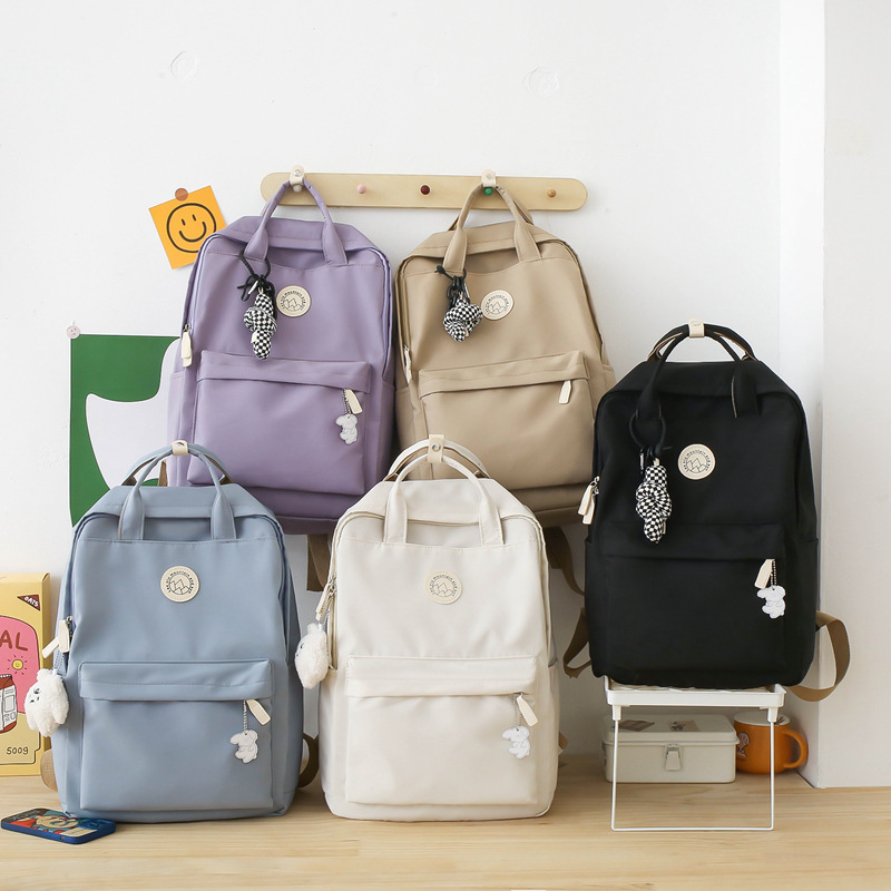 Japanese Ins Backpack Female Middle School Student 2024 New Simple Solid Color Large Capacity Casual Backpack Student Schoolbag