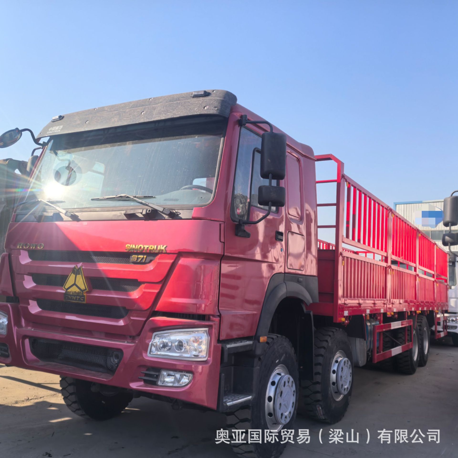 出售朝鲜豪沃8x4 12轮苍栏货车 howo集装箱载货车前四后八轮